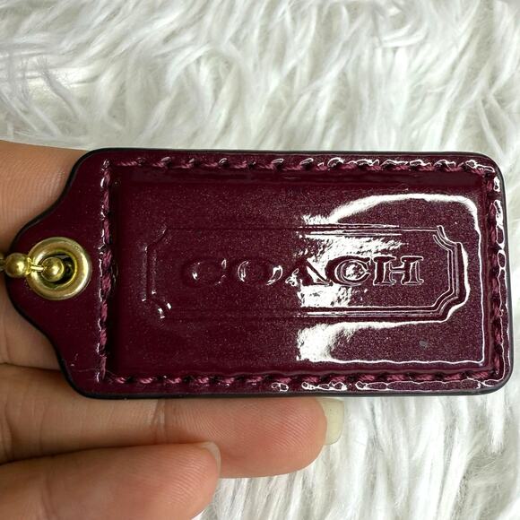 2" COACH Patent Leather Burgundy Fob Bag Charm Hang tag Hangtag - Picture 1 of 2